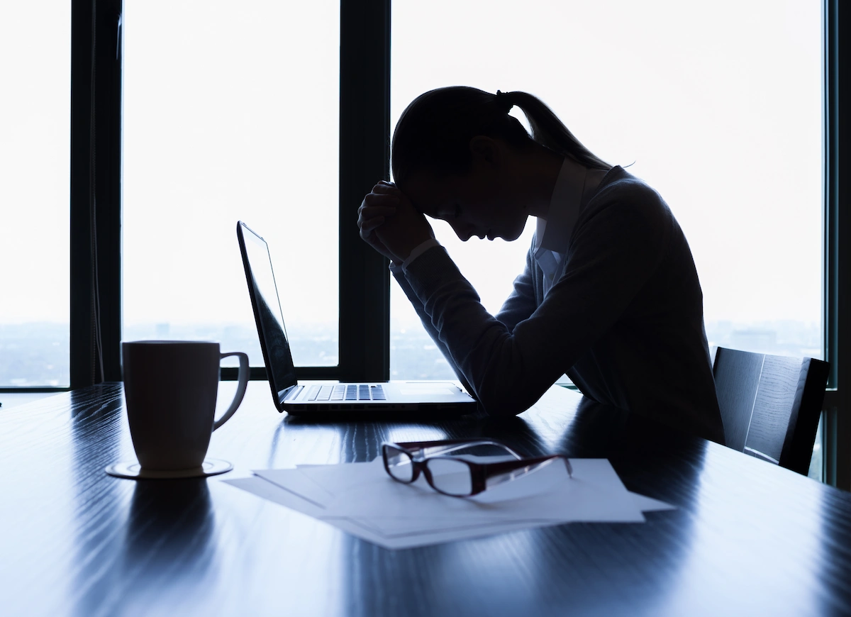 stressed businesswoman in office